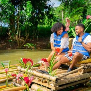 VibraGem Tours Bamboo Rafting and Limestone Massage Tour in Jamaica with a beautiful couple.