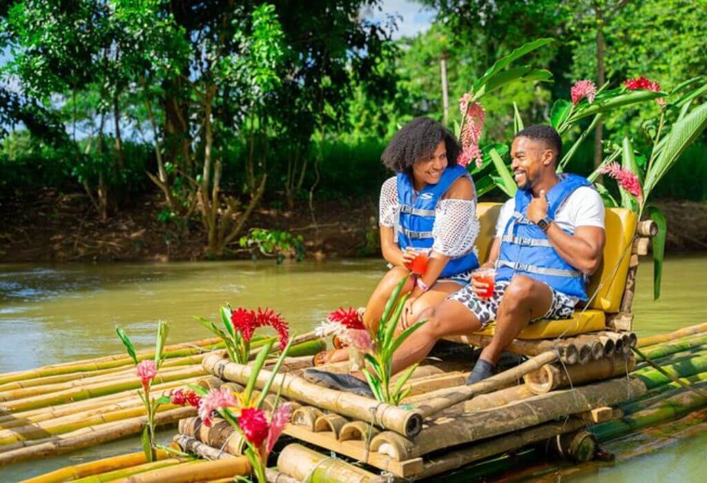 VibraGem Tours Bamboo Rafting and Limestone Massage Tour in Jamaica with a beautiful couple.