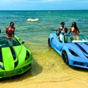 VibraGem Tours Jet Car Adventure Tour in Jamaica with african-american tourists in blue and green Jet cars.