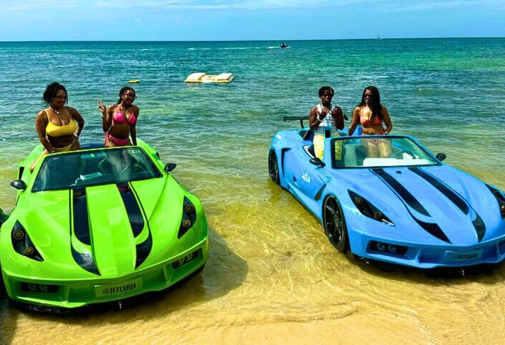 VibraGem Tours Jet Car Adventure Tour in Jamaica with african-american tourists in blue and green Jet cars.